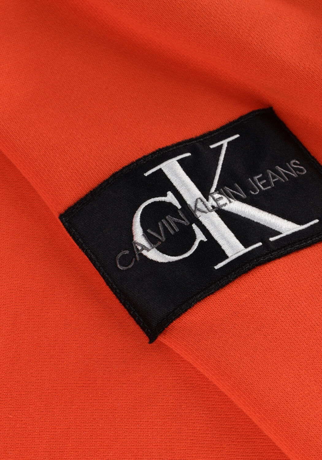 Oranje CALVIN KLEIN Sweater MONOLOGO SLEEVE BADGE HOODIE - large