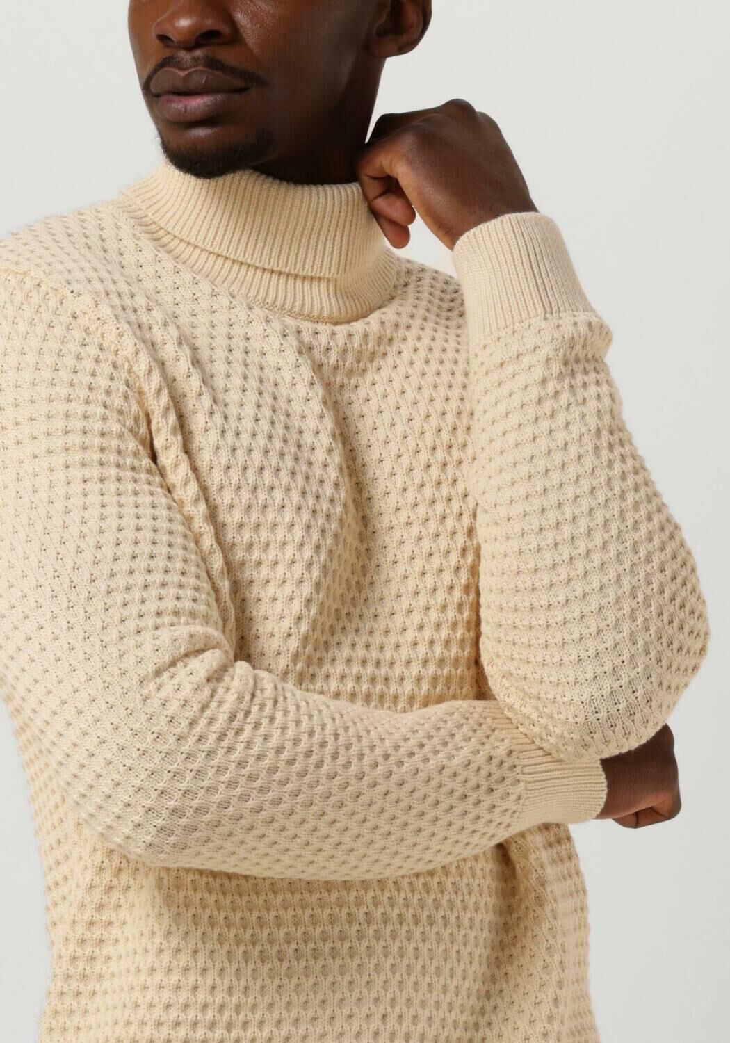 Col roulé creme homme 2025